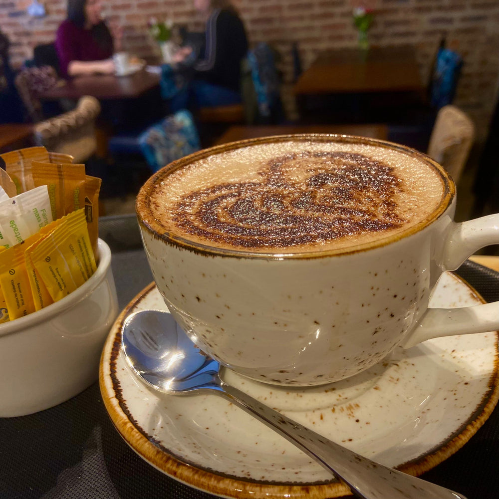 Coffee served in a ceramic cup at BALANCE