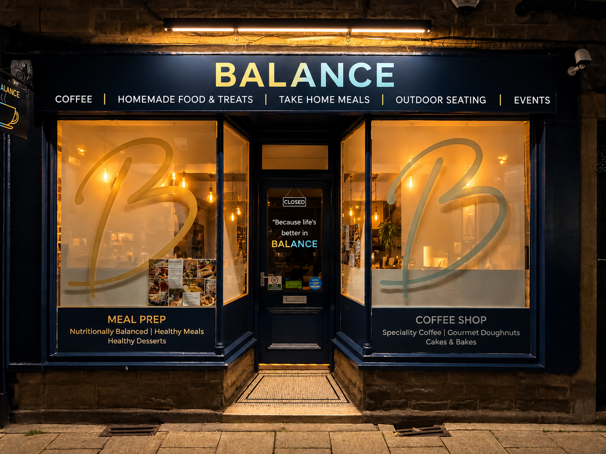 BALANCE café shop front on Crown Street in Hebden Bridge at night