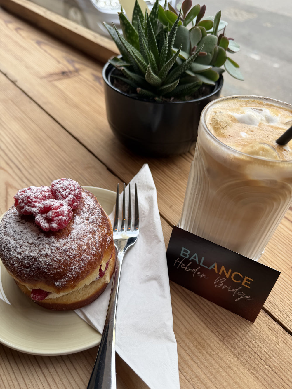 A doughnut and iced coffee at BALANCE