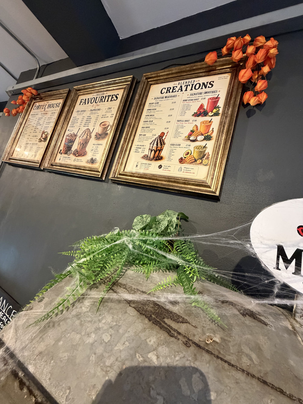 Framed prints and plants inside BALANCE